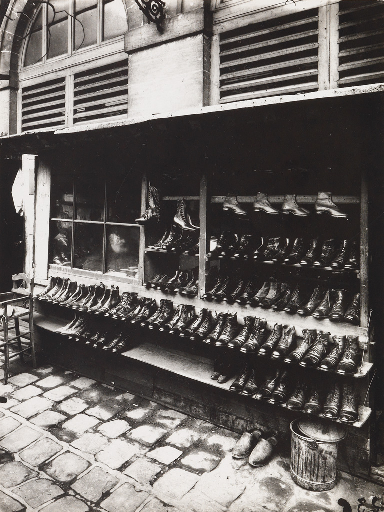 EUGÈNE ATGET (1857-1927)/BERENICE ABBOTT (1898-1991) Etal des Chassures au Marché des Carmes, Place Maubert [Stall of Shoes at the Marc